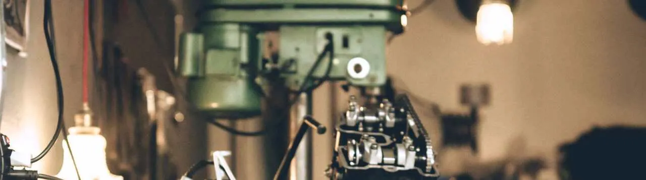 Motorcycle workshop with machines in the background