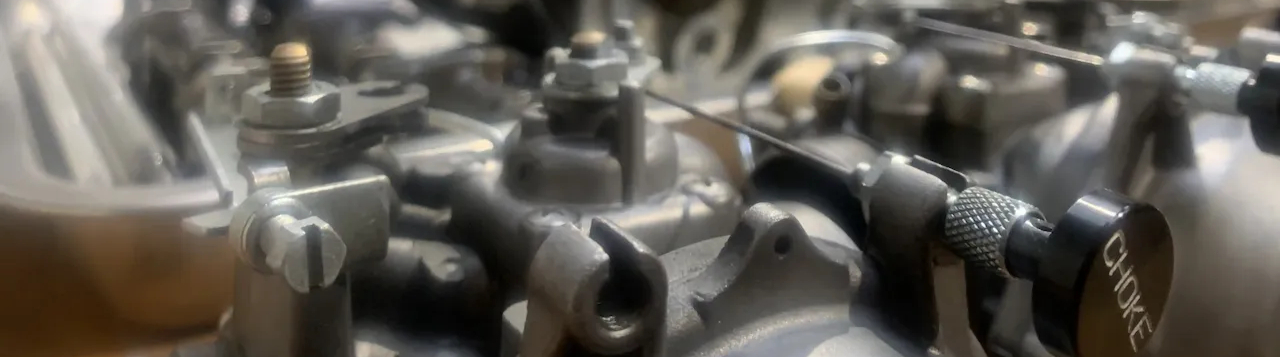 BMW R80/R100 carburetors and engine parts disassembled for inspection